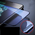 Tempered glass anti-peep screen protector for iPhone shows dust-proof mesh and cutout for camera