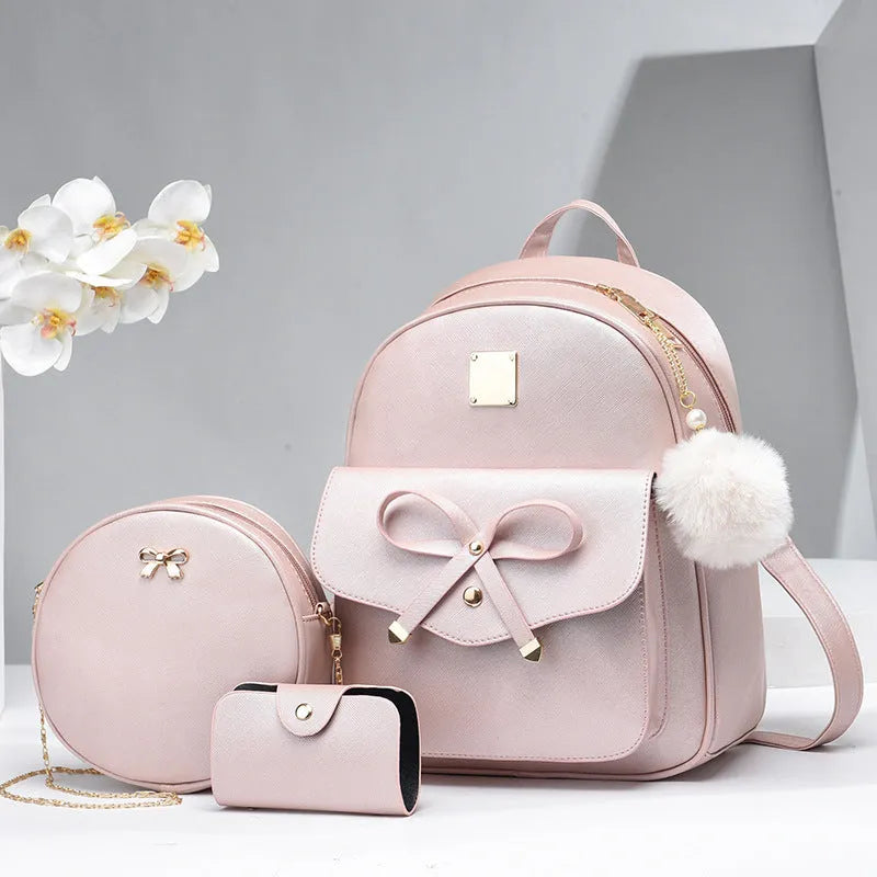 PU leather women's backpack set with bow plaid design in black, showing backpack, shoulder bag, and clutch