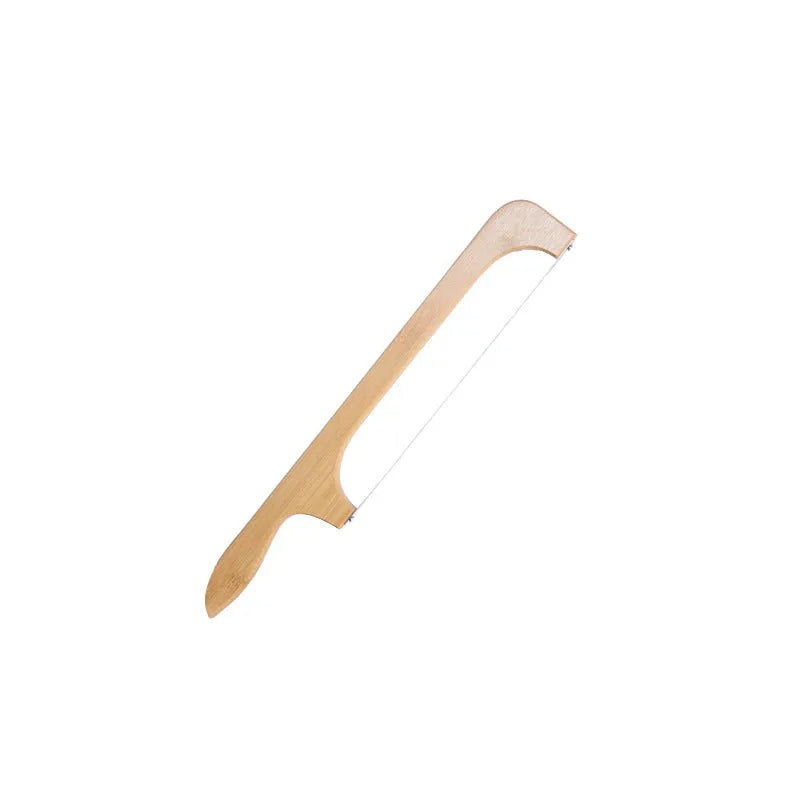 Wooden serrated bread knife 40cm with bending-resistant blade, wooden handle, shown slicing a wholemeal loaf
