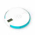 Compact 7-compartment alarm clock pill dispenser with digital timer display in multiple colours.
