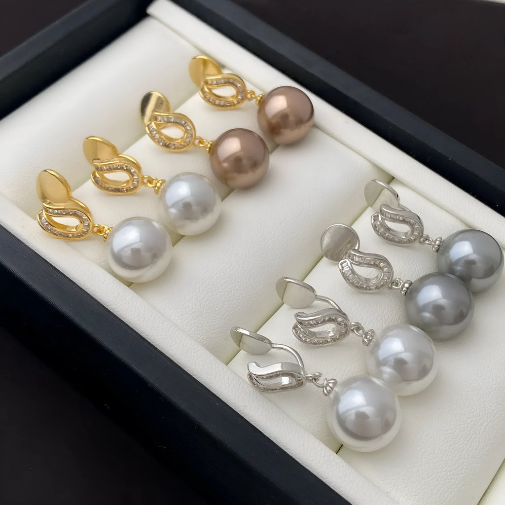 Geometric champagne pearl earrings with copper base and inlaid zircon, light luxury style, ear clip option