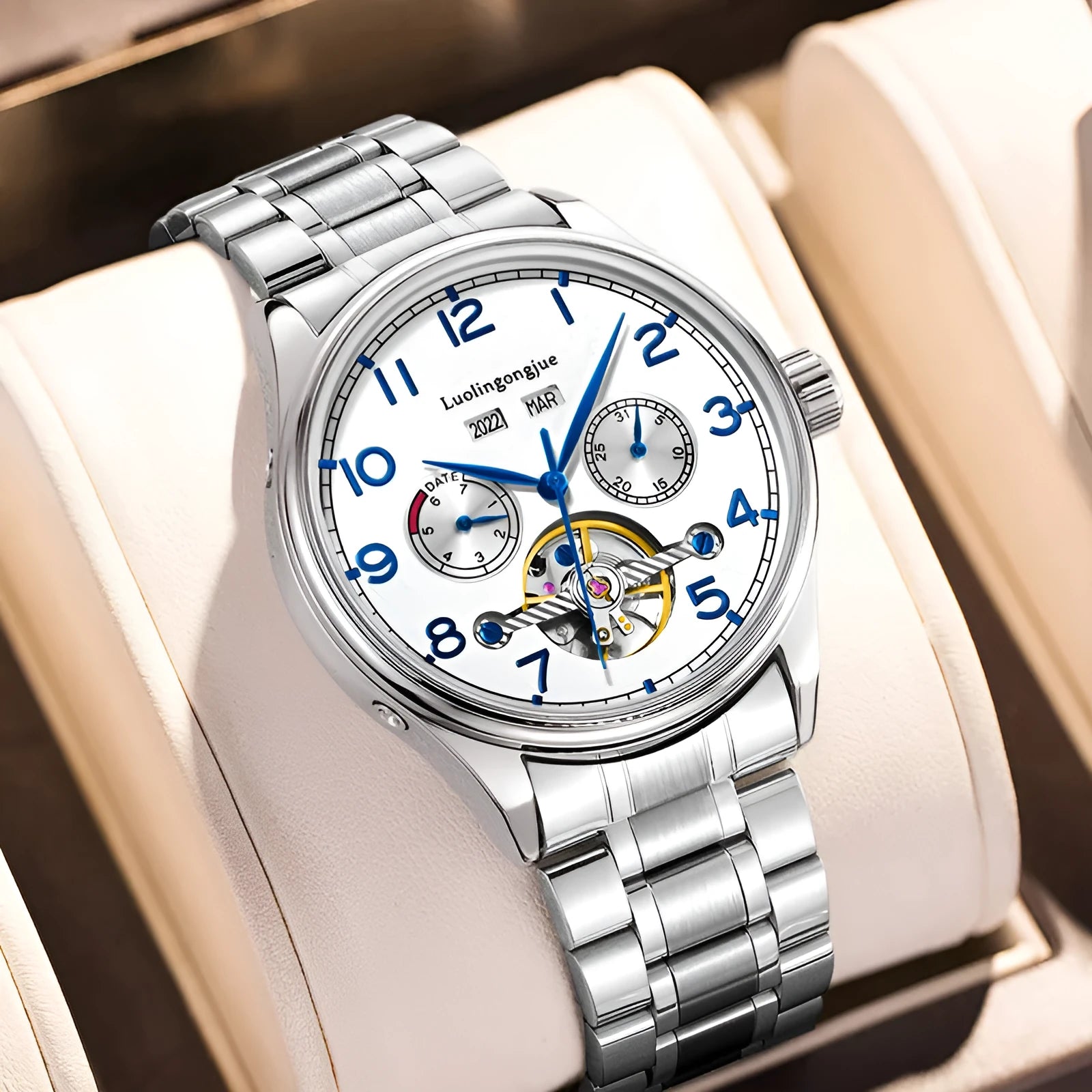 Men's stainless steel mechanical watch with hollow dial, sapphire glass, and leather strap.