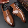 Men's black leather dress shoes with low heel, front strap, sewing thread detailing, and adhesive rubber sole