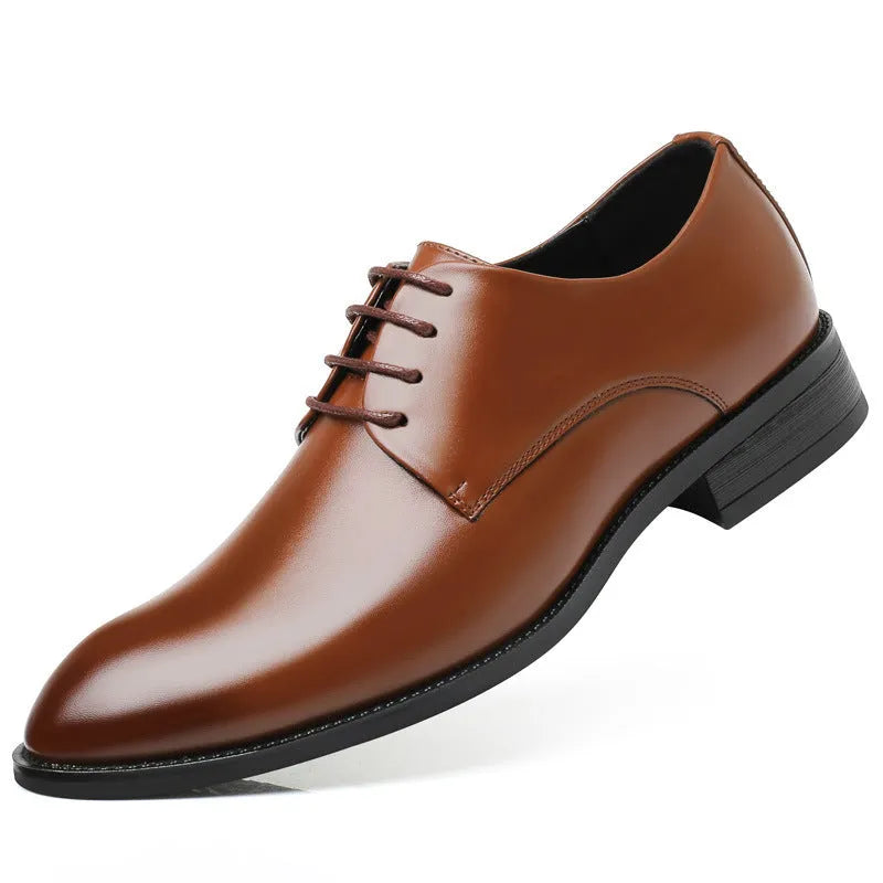 Men's black leather dress shoes with low heel, front strap, sewing thread detailing, and adhesive rubber sole