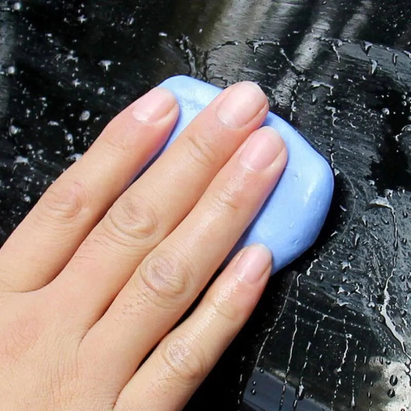 Dark blue Magic Clay car washing mud block with universal fit for paint decontamination