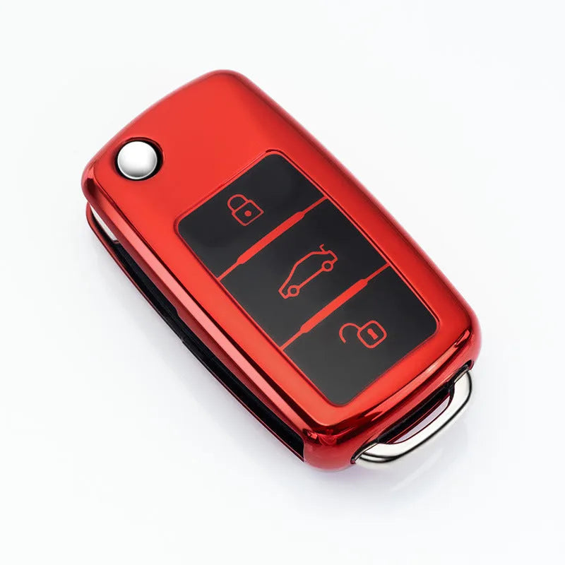 VW Model A folding car key enclosed in a coloured TPU protective case with a metal buckle loop.