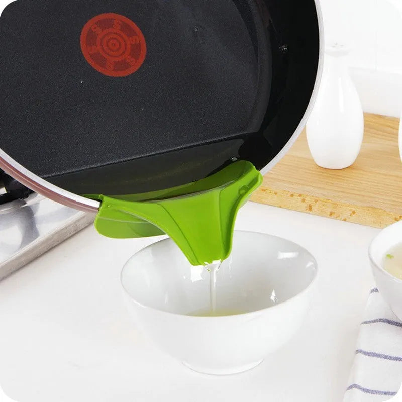 Green silicone kitchen funnel with curved design for round pots