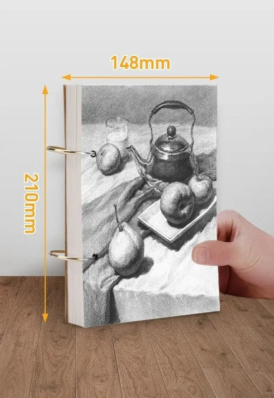 8K thickened sketchbook open showing coil binding and marker illustration on specialised paper