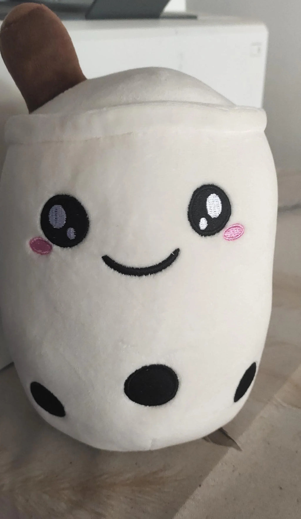 Cute fruit drink plush cushion in pink strawberry shape with embroidered face on short plush fabric