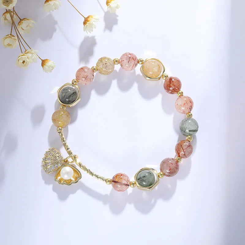 Women's crystal bracelet with colourful shell or red flower design and animal/Zodiac cartoon modelling.