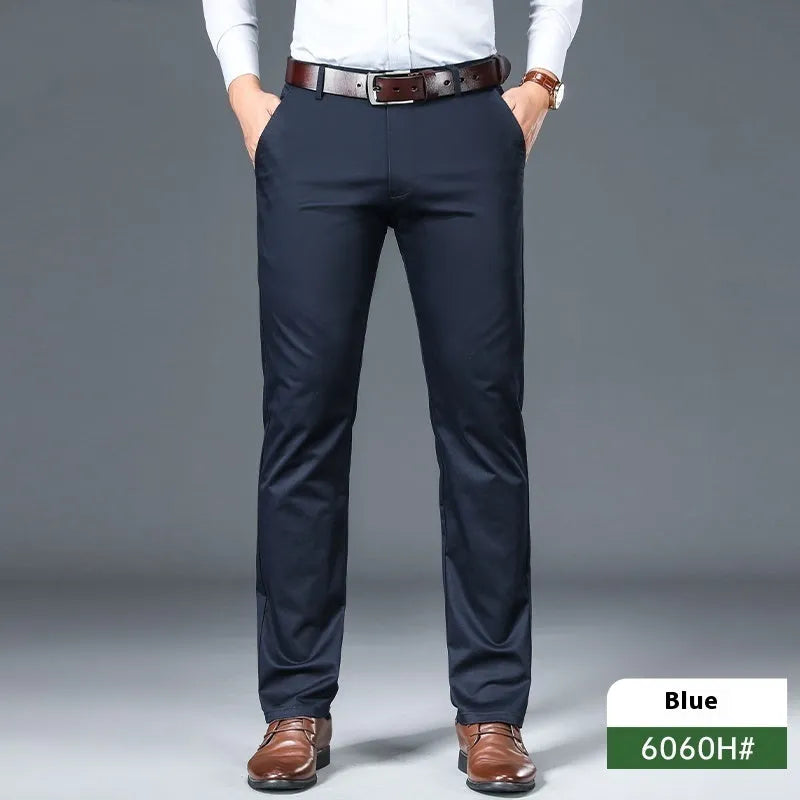 Men's thin straight-leg trousers in black on a hanger, showing the business casual cut and non-iron fabric.