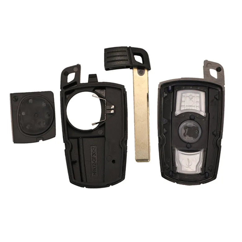 BMW semi-intelligent three-button remote car key fob on a grey background