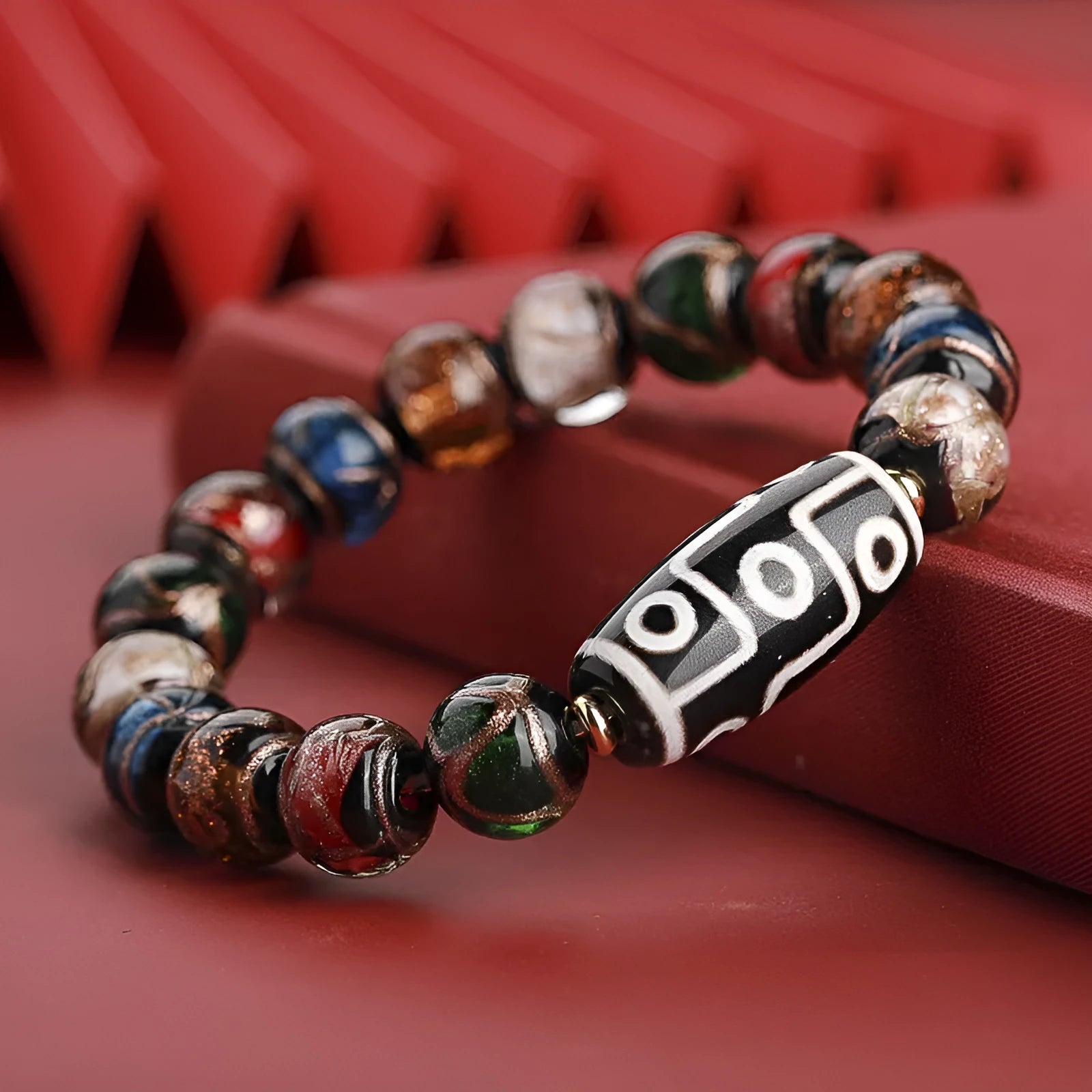 Chinese coloured glaze bracelet with ancient five-colour pattern and year snake lucky beads