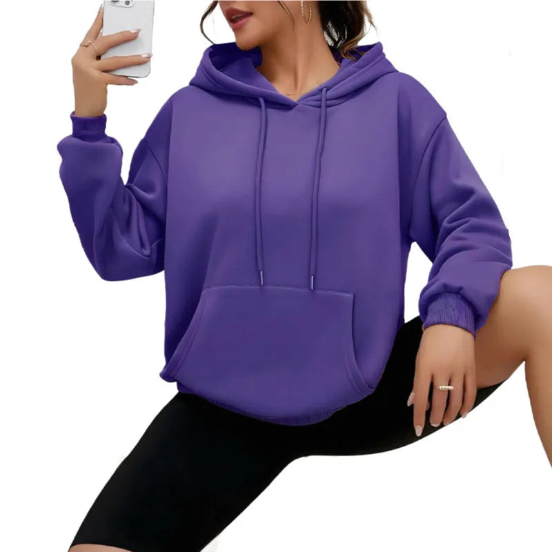 Women's loose grey drawstring hoodie with front pocket, laid flat.