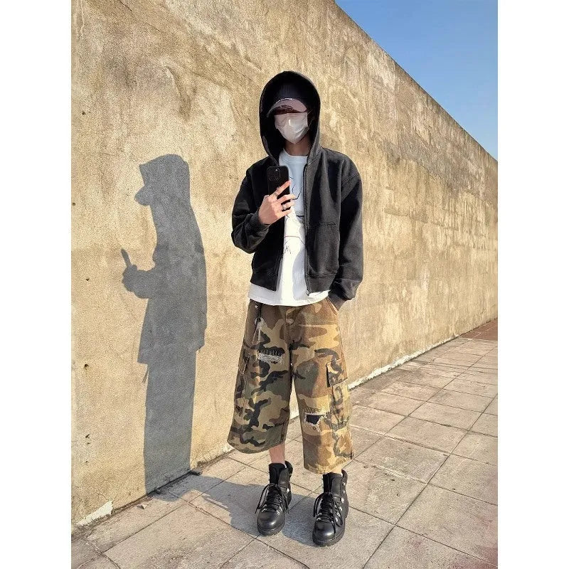 Men's camouflage cropped jeans with retro patches and ripped knees in straight cut loose fit