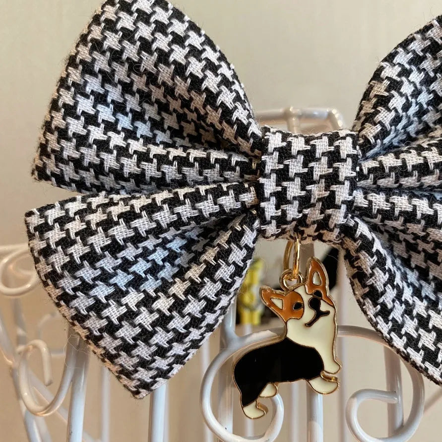 Cloth pet bow tie decoration in wine red checkered pattern with bell on a cat collar