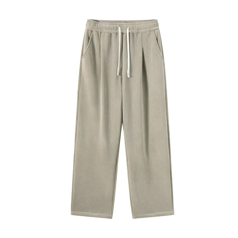 Men's apricot coloured double-sided polar fleece winter pants with a loose fit and drawstring waist.