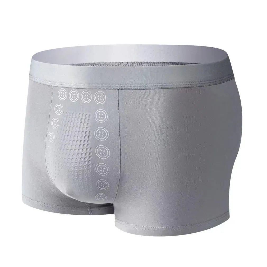 Men's solid colour mid-waist underwear made from milk silk fabric with integrated massage particles.