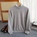 Men's loose-fit half-collar wool sweater in coarse knit yarn, shown in a camel colour.