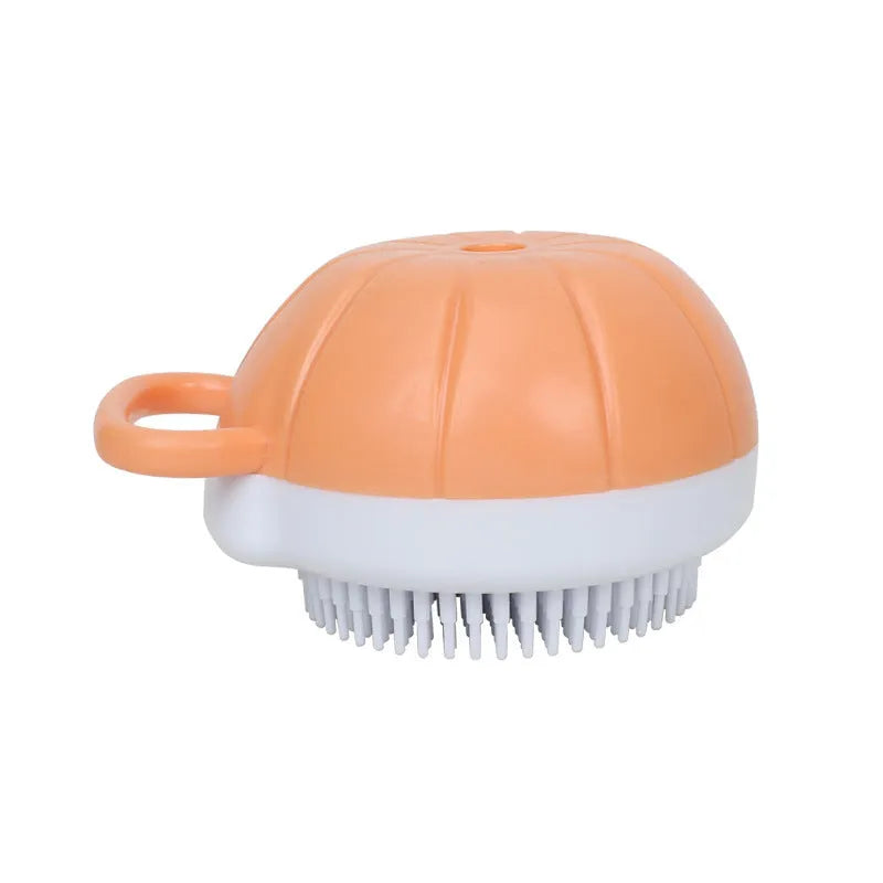 Orange TPR dog bath brush with shampoo dispenser, massage bristles and comb teeth.