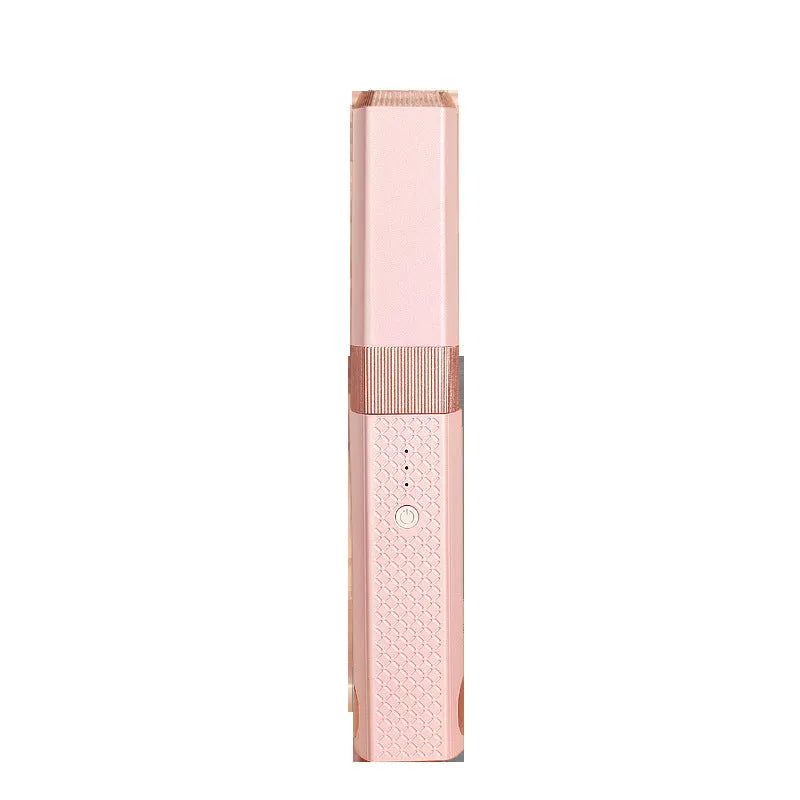 Pink and green cordless USB hair straightener and curler with ceramic plates, shown with USB cable.