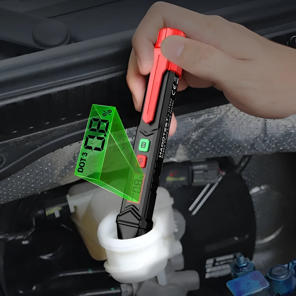 Digital brake fluid tester with display screen showing colour-coded moisture readings