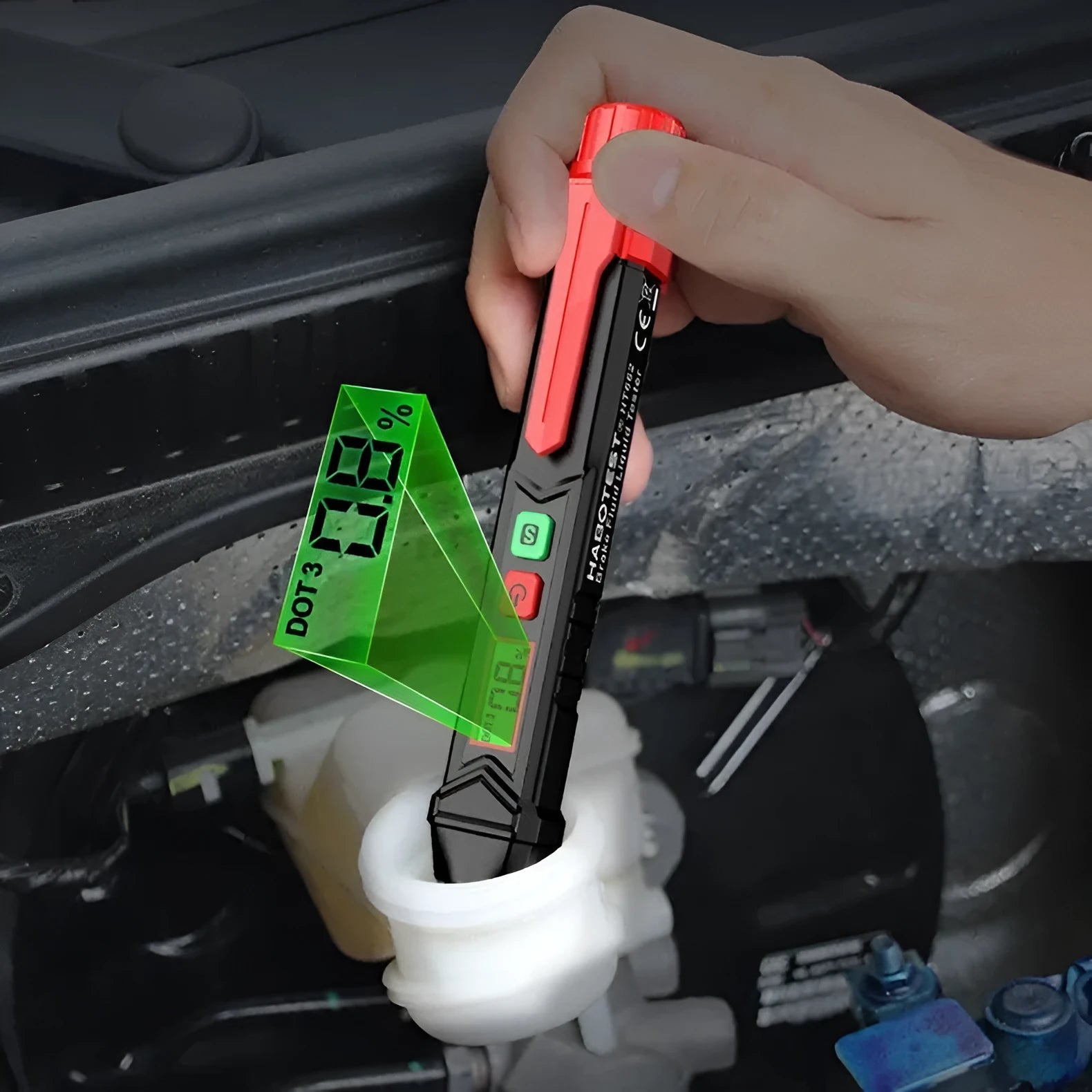 Digital brake fluid tester with display screen showing colour-coded moisture readings