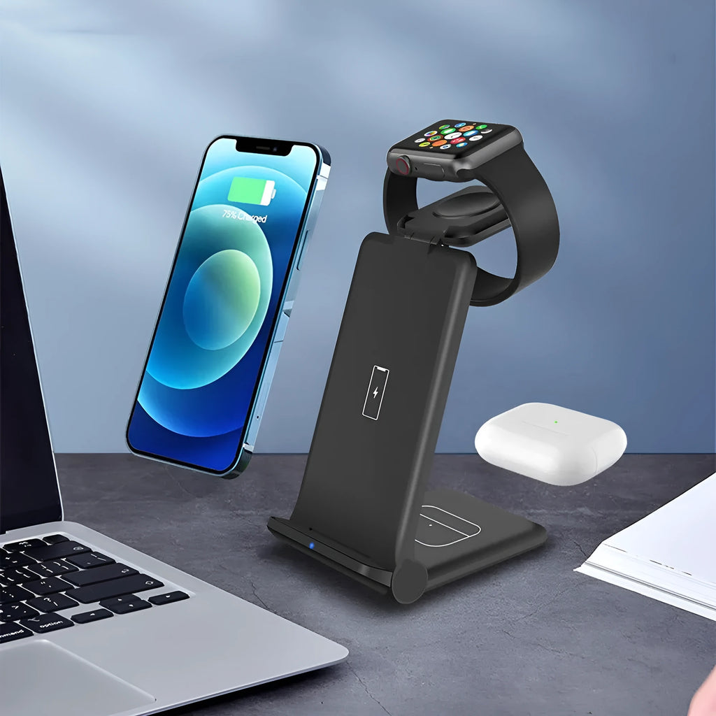 White 3-in-1 foldable wireless charging station charging an iPhone, Apple Watch, and AirPods on a desk.