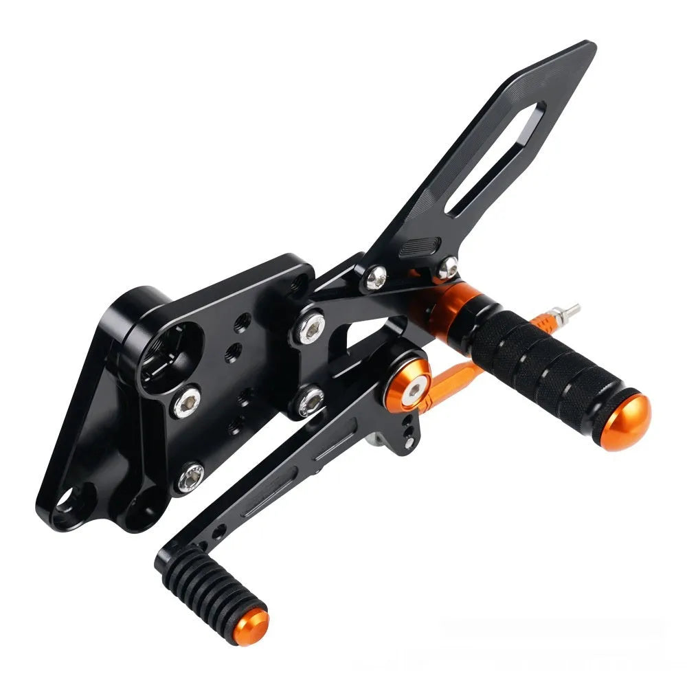 KTM DUKE motorcycle rear shift pedal support assembly modification kit in black and orange