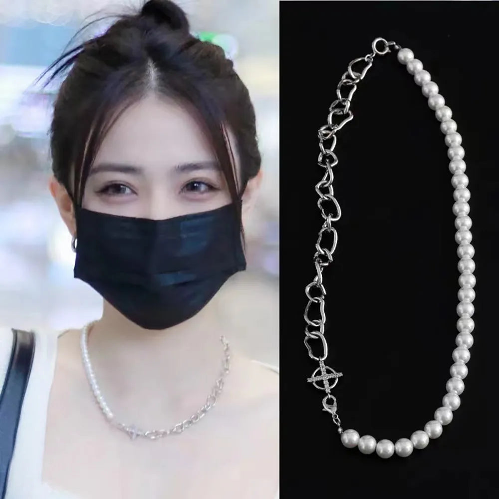 White geometric asymmetric clavicle chain necklace with twisted silver-tone chain and minority design elements