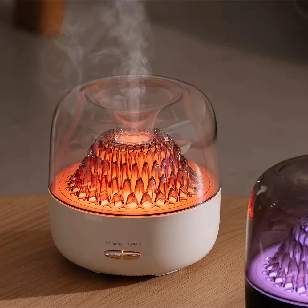 Beige resin round desktop aroma diffuser with colourful light on a wooden nightstand