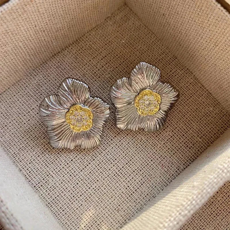 Retro textured stud earrings with gardenia camellia floral design in two-tone E3002 colour