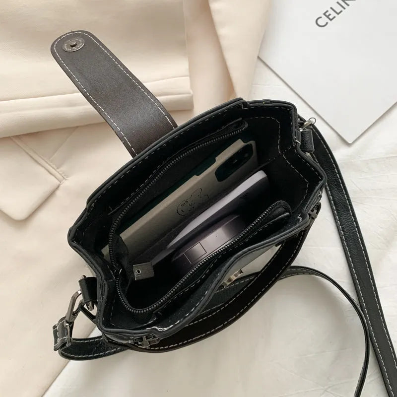 PU shoulder crossbody bag in white, blue or black with adjustable strap and retro street style