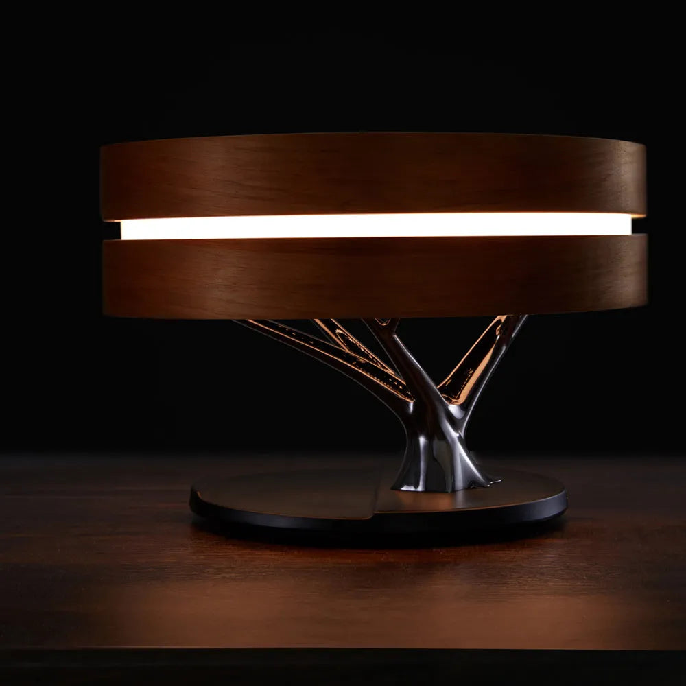 Round maple coloured ABS PC Bluetooth speaker LED lamp with wireless charging pad for living room