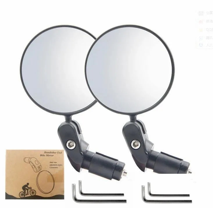 Black foldable convex rearview mirror on a car side mirror, showing its adjustable angle.