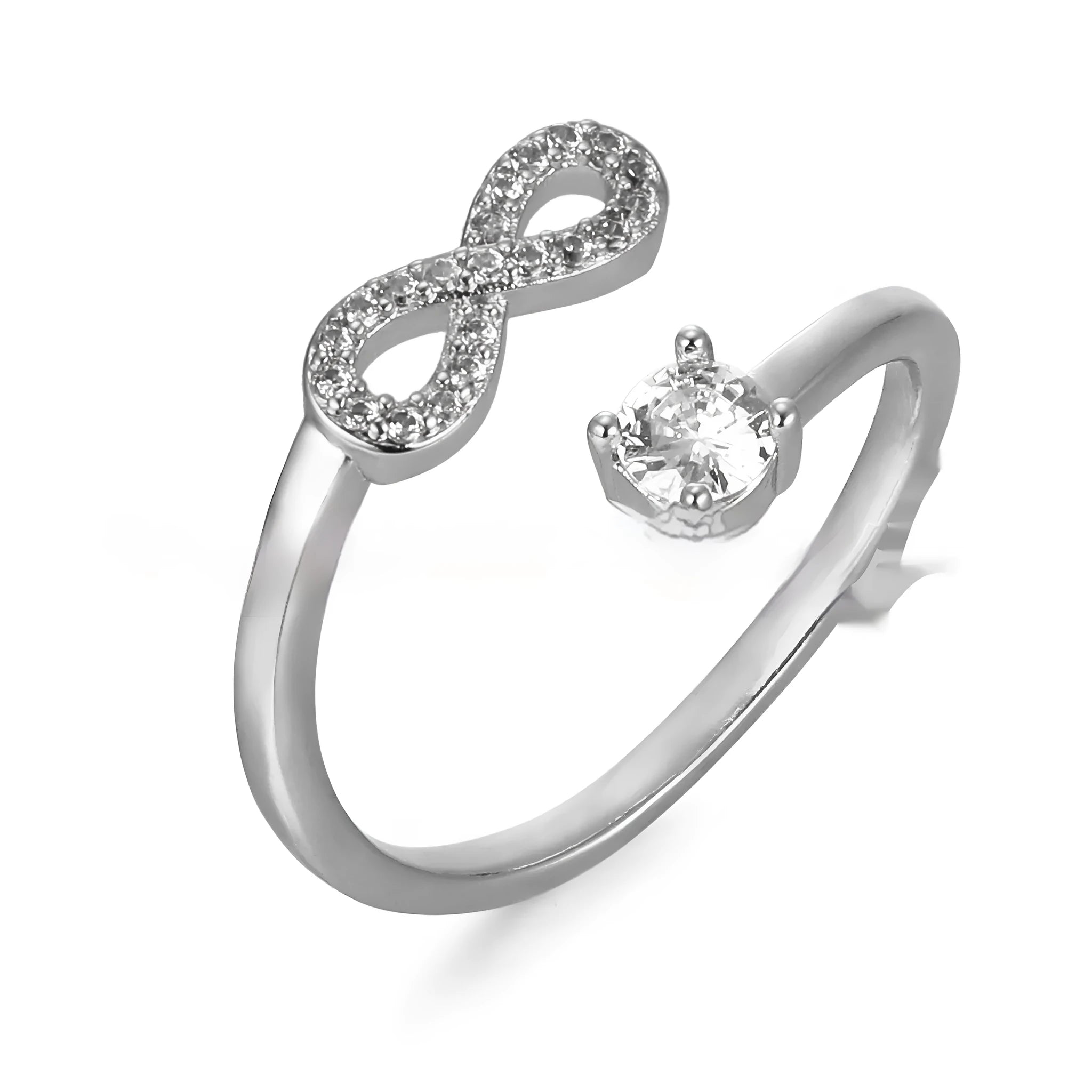 Geometric open zircon letter ring in gold on a hand, showing the detailed character design.