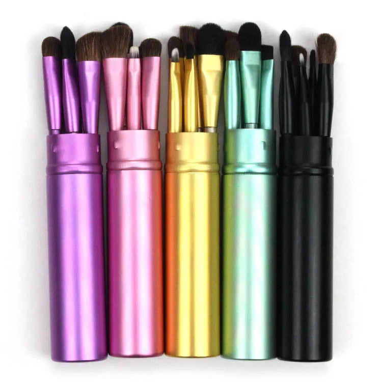 Makeup brush with soft synthetic fibre bristles, available in black, gold, green, pink and purple for professional, family or travel use