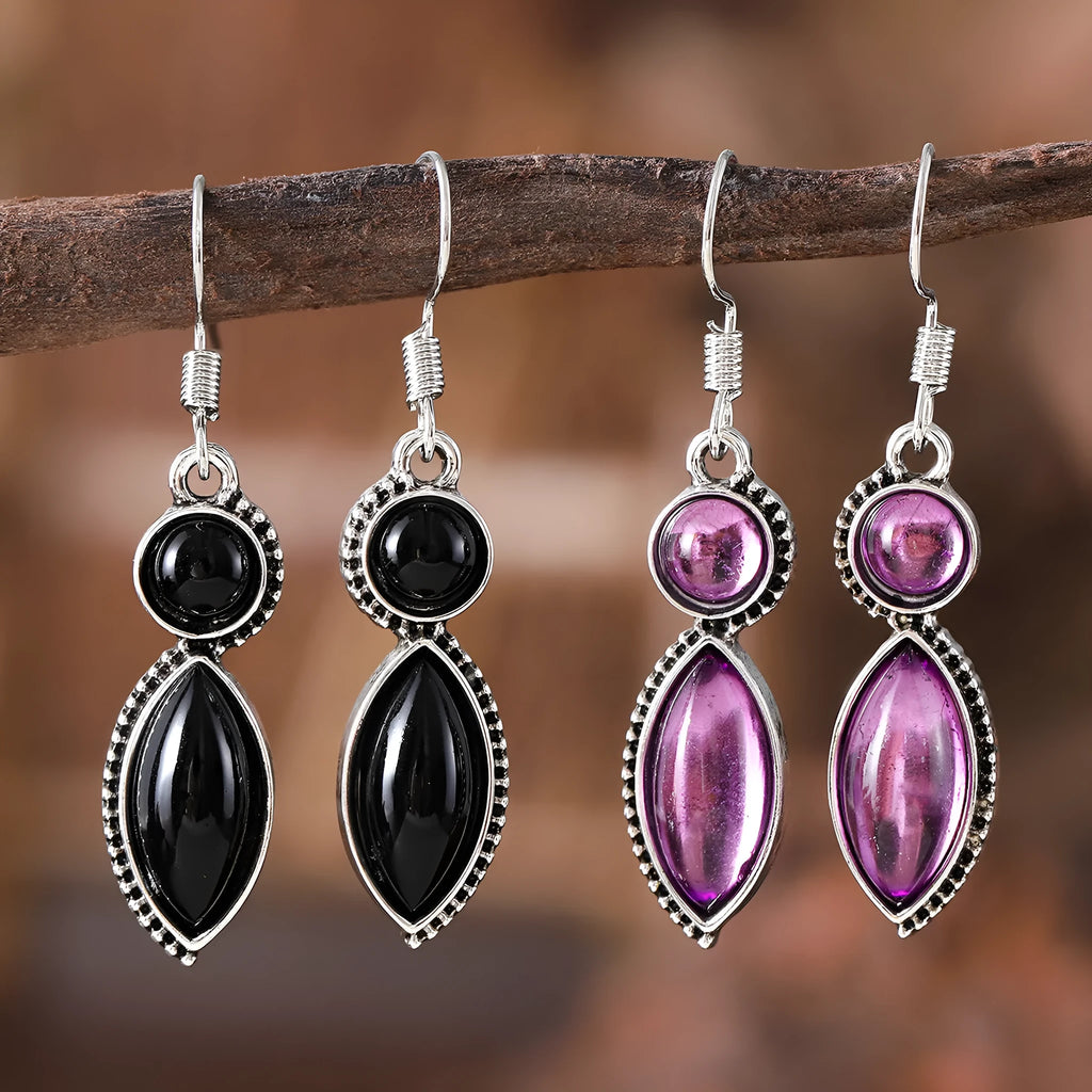 A pair of vintage geometric pendant earrings in black and purple with a round detail, made from zinc alloy.