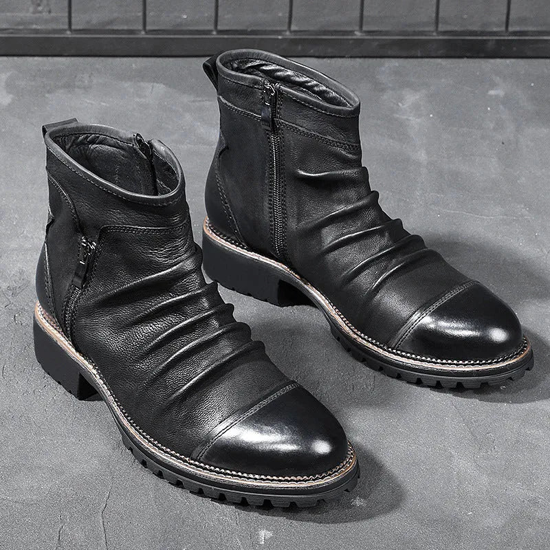Black mid-calf cowboy boots with side zip and embossed leather texture