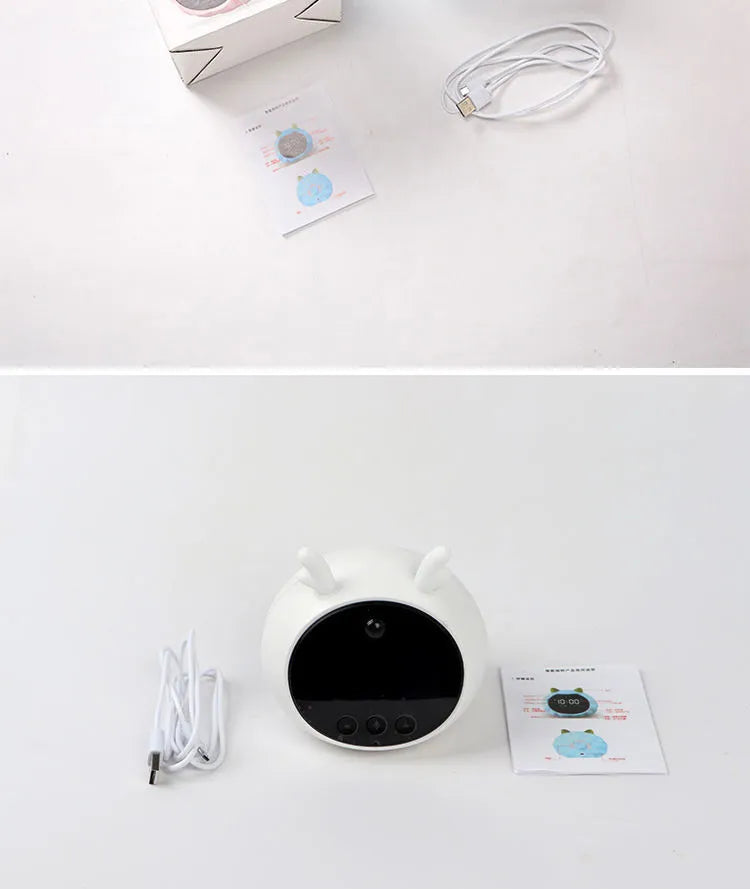 Smart alarm clock with voice control, motion sensor, and luminous display in silicone construction