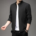 Man wearing a thin, loose lapel Korean-style casual jacket in a neutral colour.