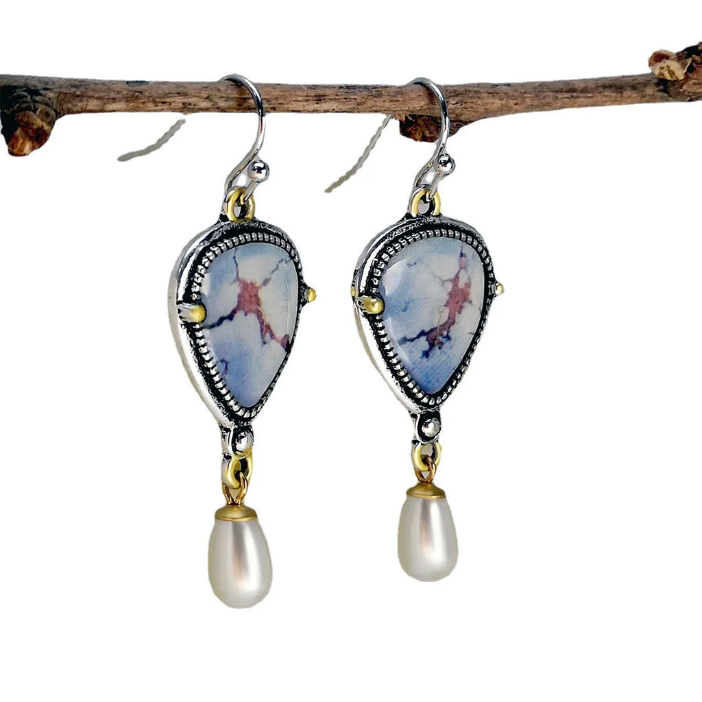 Retro blue geometric drop earrings with synthetic opal and pearl accents on electroplated metal