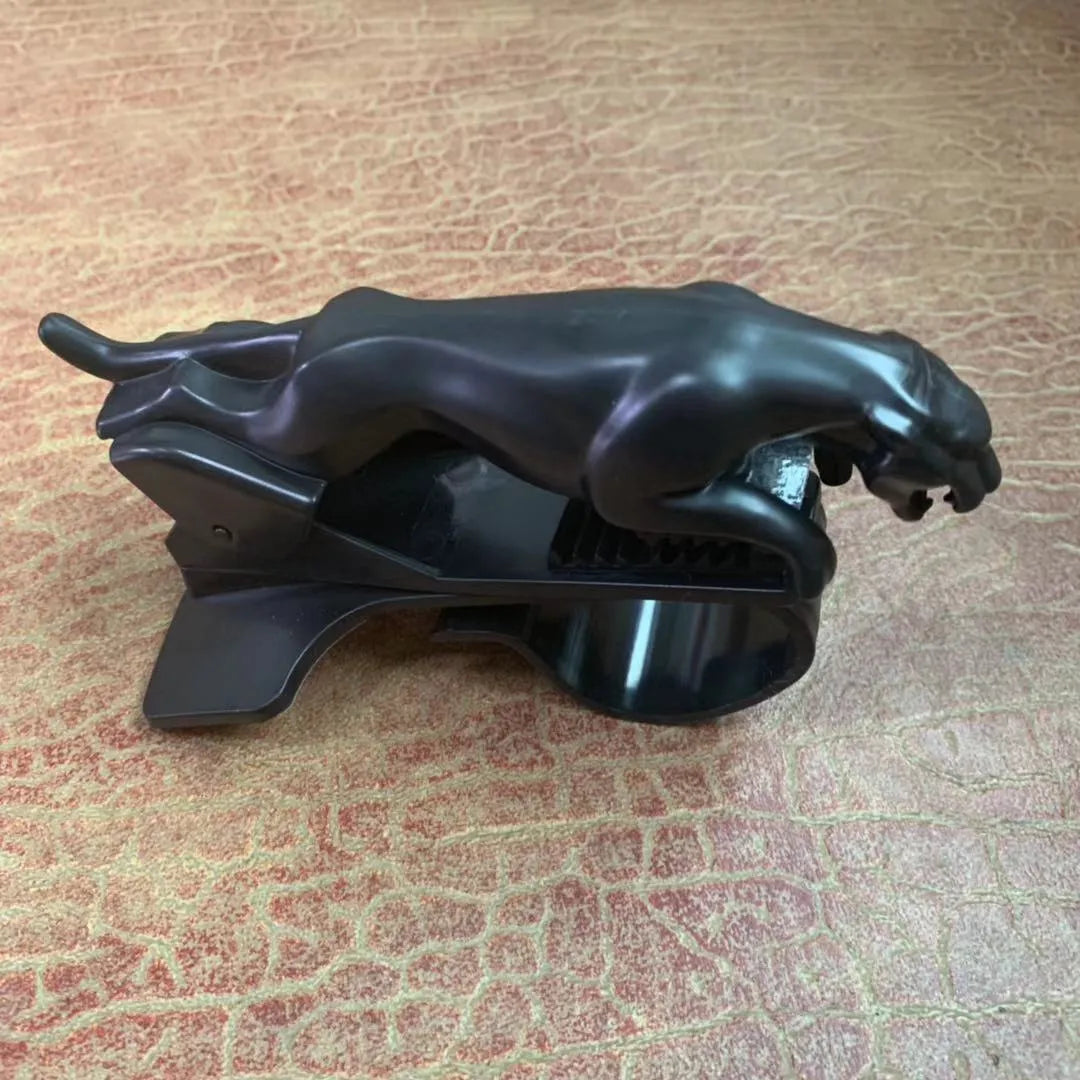Rotatable car mobile phone holder bracket in black finish mounted on a car dashboard.
