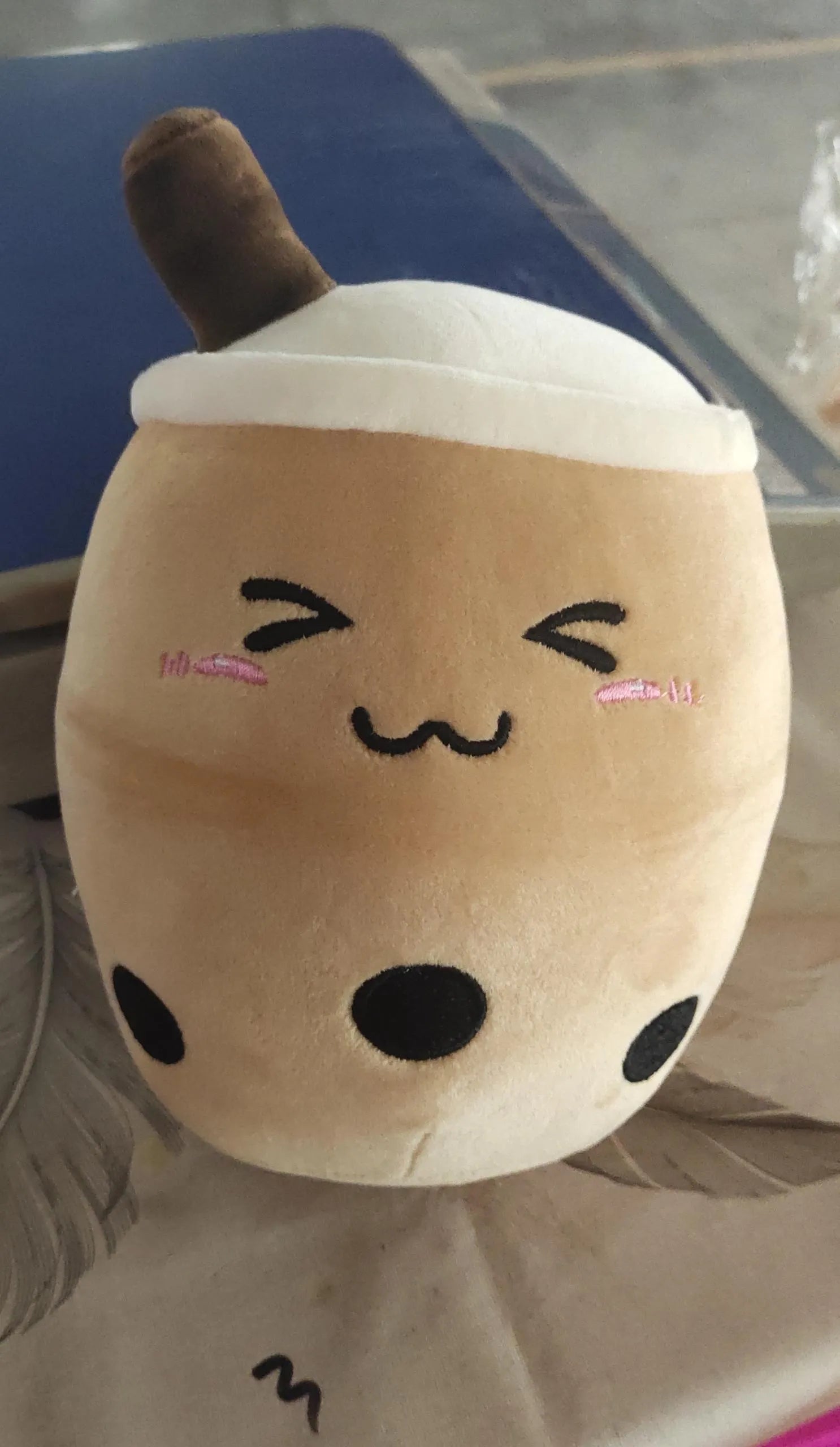 Cute fruit drink plush cushion in pink strawberry shape with embroidered face on short plush fabric