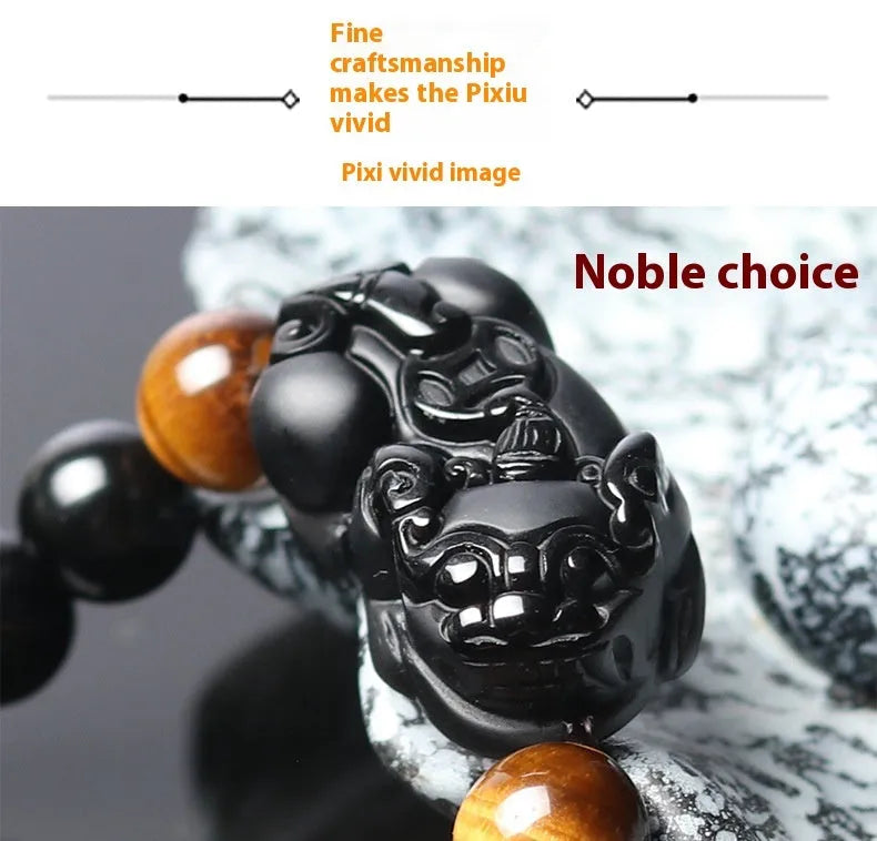 Mexico gold sheen obsidian Pi Xiu bracelet in unisex ethnic style on a wrist.
