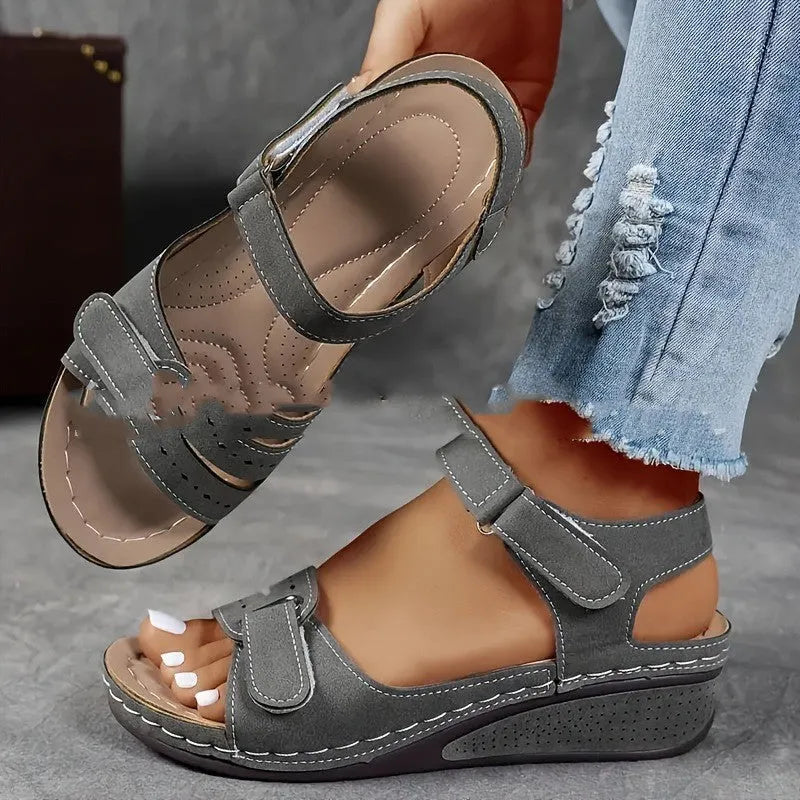 Beige plus size strap sandals with a thick composite sole and adjustable Velcro fastening on a white background
