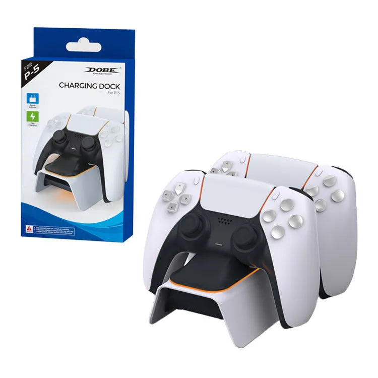 White PS5 dual controller charger with LED indicators and two gamepads docked on a wooden desk