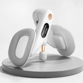 Grey coloured pelvic floor muscle trainer with a counter display, held in hand.