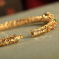 Gold-plated copper xiangyun gourd bracelet with adjustable silk cord for women
