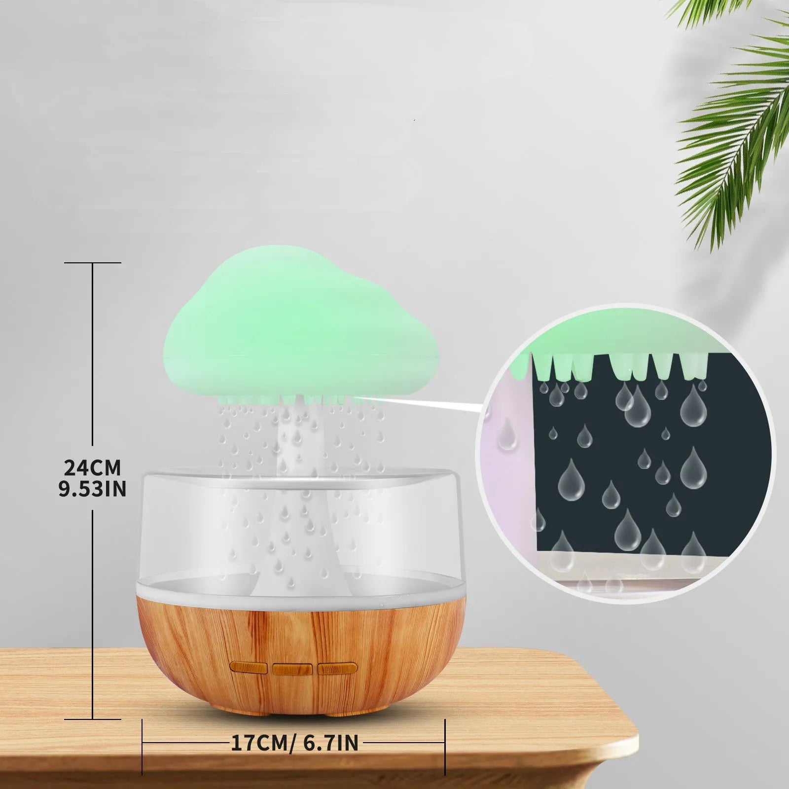 White cloud-shaped aromatherapy humidifier with colour-changing night light on a table.